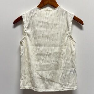 Chic Cream Sleeveless Blouse